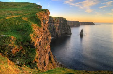 Cliffs of Moher and Burren day trip including Dunguaire Castle, Aillwee Cave, and Doolin from Galway